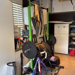 Squat Rack, Weights, And Bench