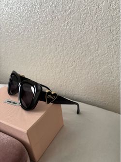 Miu Miu Women’s Sunglasses