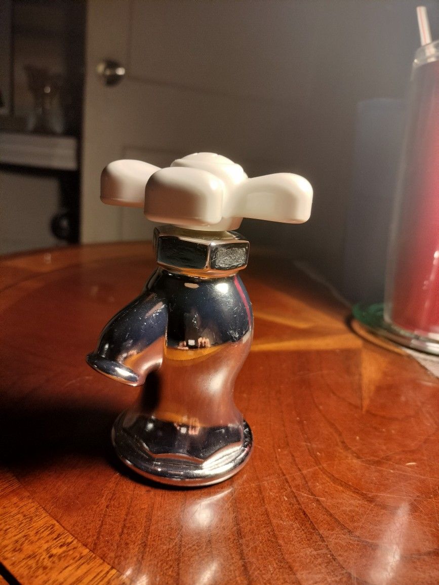 Vintage Avon. Just A Twist, Collectors Cologne bottle.