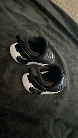 6c . Nike slip on baby Sneakers Black and White