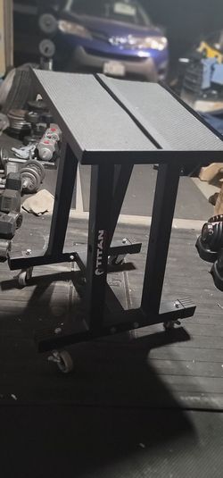titan dumbell stand on caster wheels