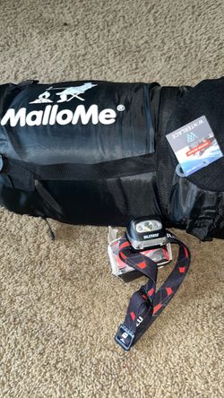 MalloMe Black Sleeping Bag Compressed with white led headlamp