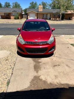 2014 Kia Rio, LX four-door hatchback