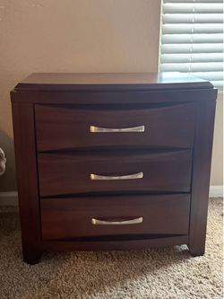Dark wood dresser/nightstand 30$