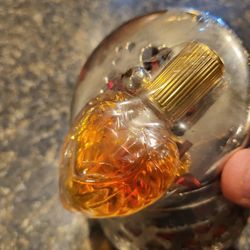 Perfume and silver round metal box with lid