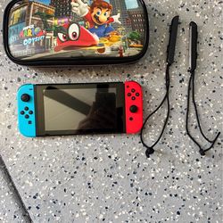 Nintendo switch with mario carrying case