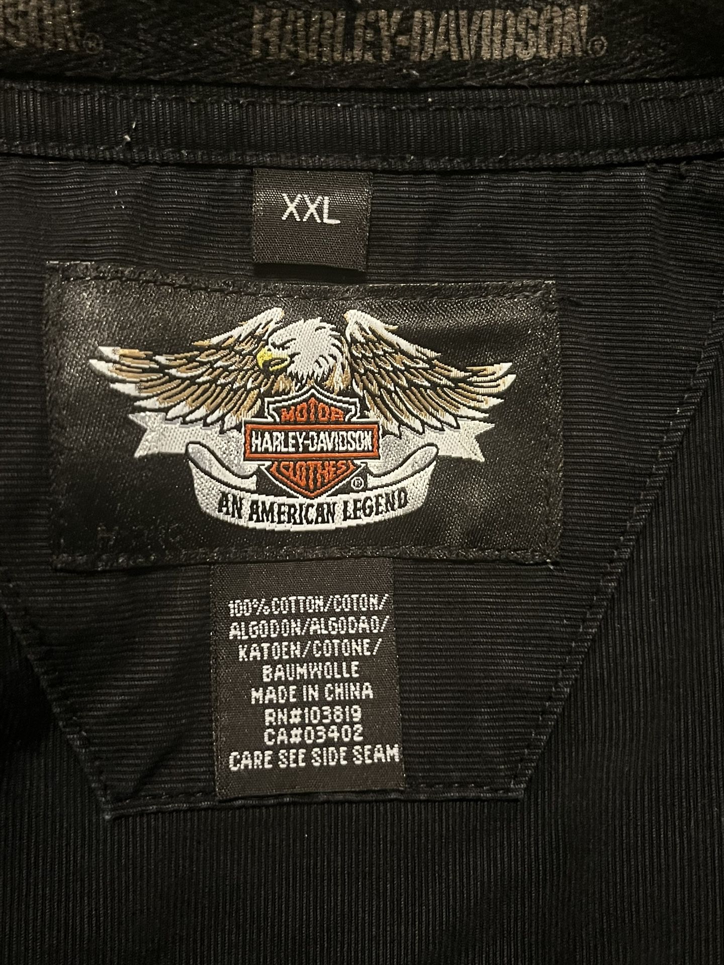 Harley Davidson Leather Vest , Leather Shams And Long Black Shirt .