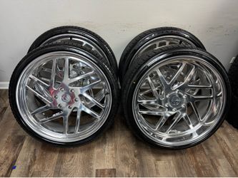 NEW staggered 24x9 and 24x11 esko wheels polished wrapped in Lexani tires
