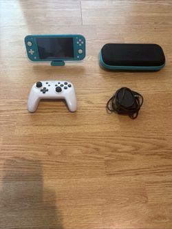 Turquoise Nintendo Switch, White Pro Controller, Case, and Charger. GREAT CONDITION.