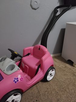 Carro de niña rosado hot sale