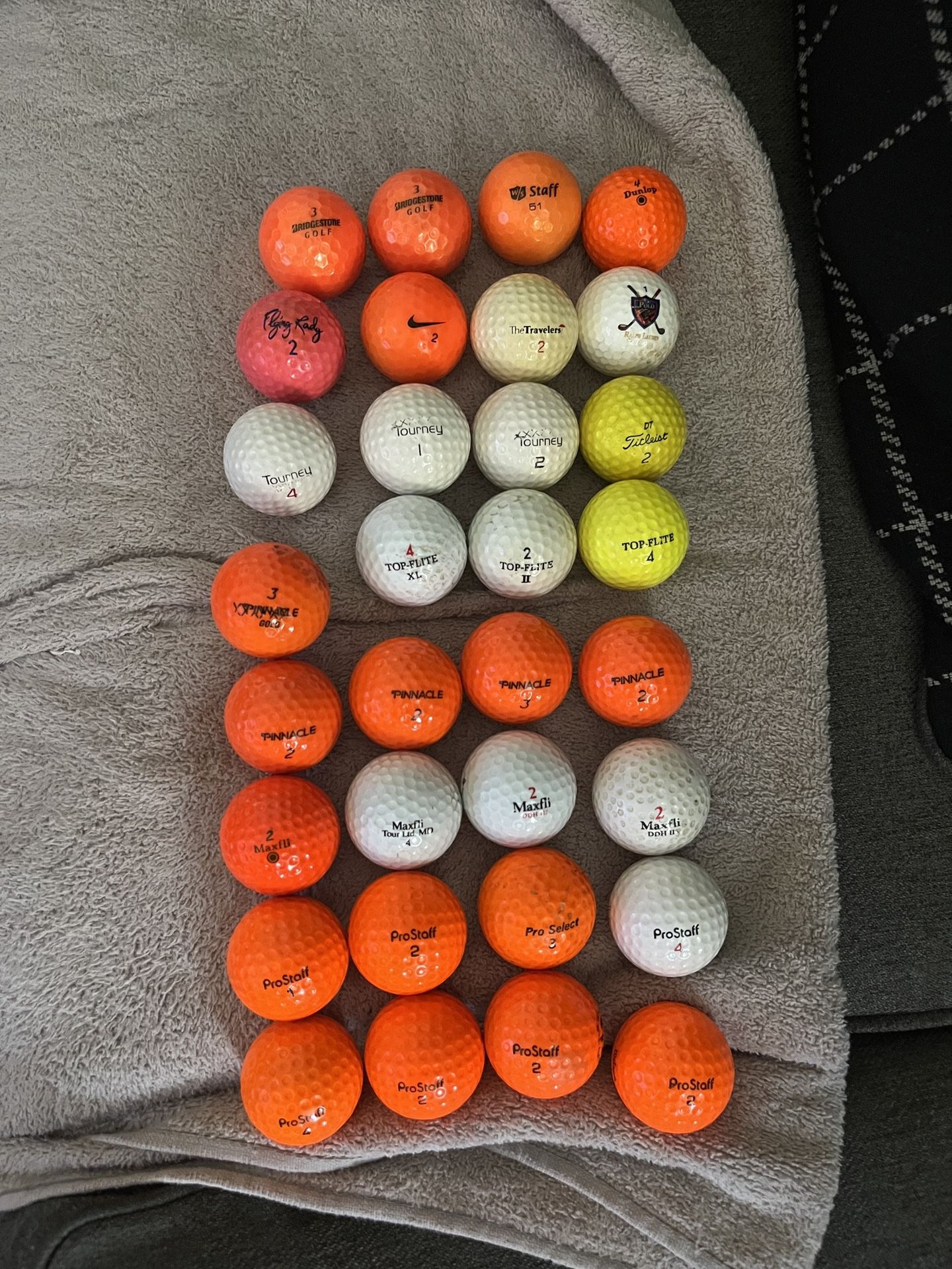 32 golf balls! Bridgestone, Wilson, Wilson staff, Dunlop, MacGregor, and many more!