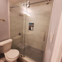 SHOWER DOORS AND GLASS
