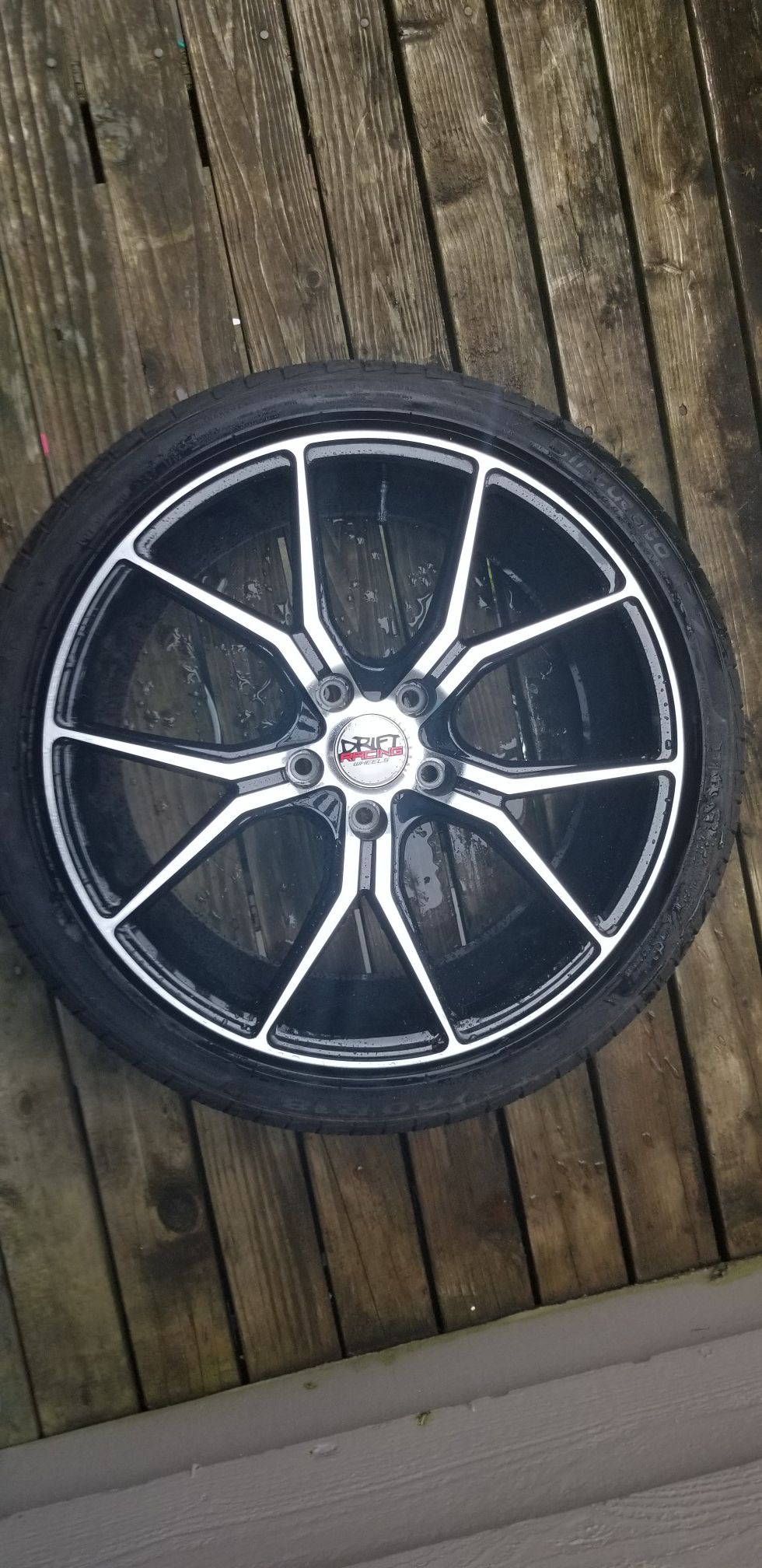 One 18 inch wheel with tire 225/40/18