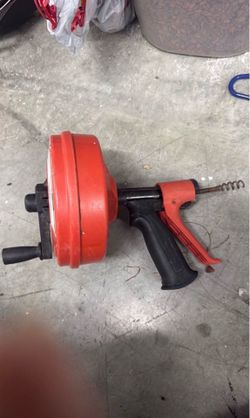 Rigid handheld drain snake
