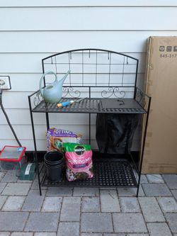 Brand new in box folding potting table