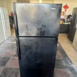 Used Whirlpool black refrigerator