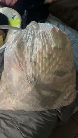 Bag full of baby girl clothes