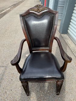 Dark Wood Carved Armchair with Black Leather Seat