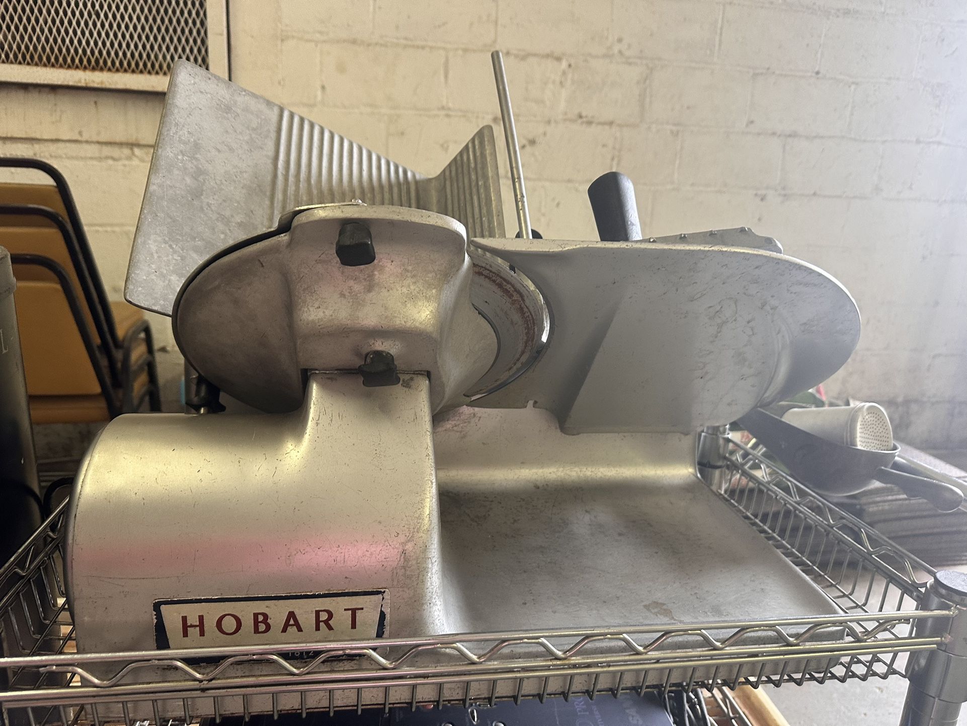 HOBART Heavy duty commercial meat & cheese slicer.