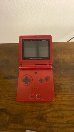 Red game boy advance SP + Pokémon ruby red