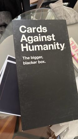 Cards Against Humanity with most (I think 4) expansion packs