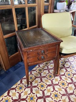 Antique 1940s, solid wood nightstand with leather top and casters