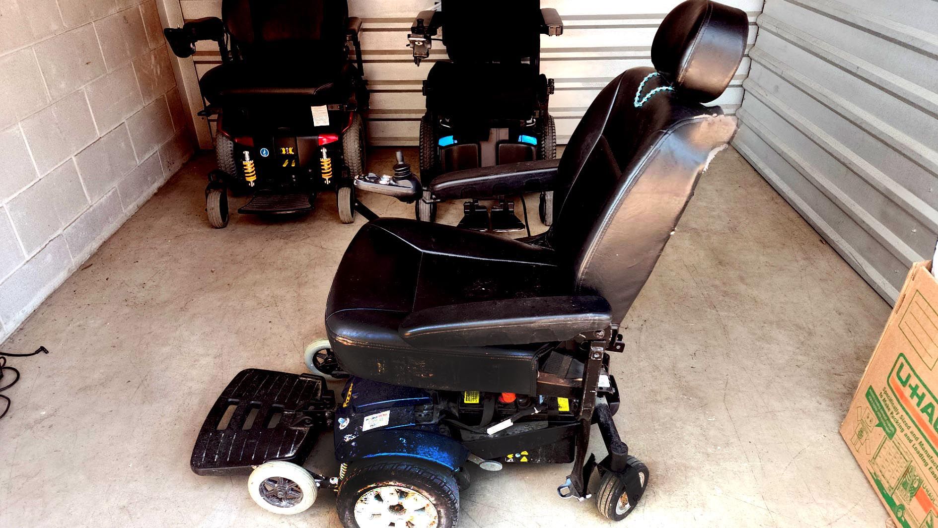 Electric wheelchair with newer battery and charger