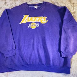 Vintage Los Angeles Lakers Sweatshirt  • Long Sleeve • Size : 5-XL • By : Majestic • Purple/Yellow/White  • PN-59157.

Item: 7421
BOO-1