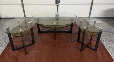Coffee table with two side tables.