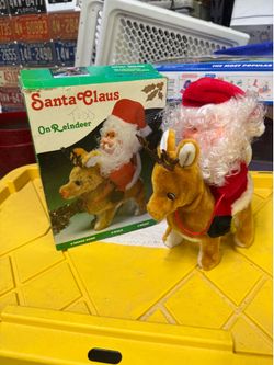 Vintage 1985 Santa on Reindeer Battery Operated