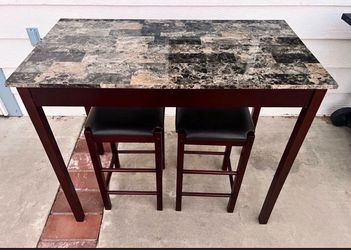 Table with two barstool chairs