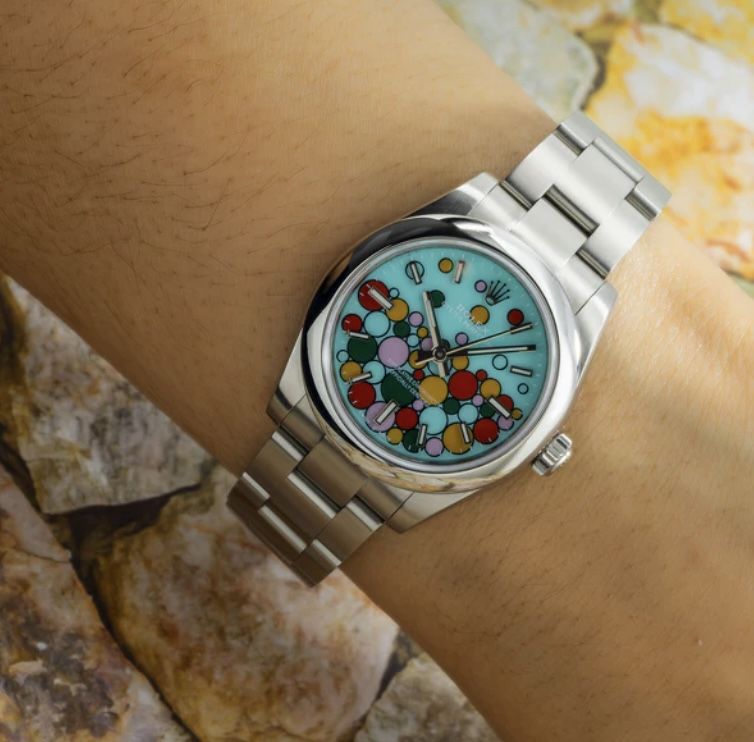 ROLEX OYSTER PERPETUAL 31MM TURQUOISE CELEBRATION DIAL
