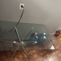 Glass Table And 4 Plastic Chairs 