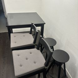 Kitchen Table And Chairs  (table is 32”x32”x36” tall, chairs with cushions) 