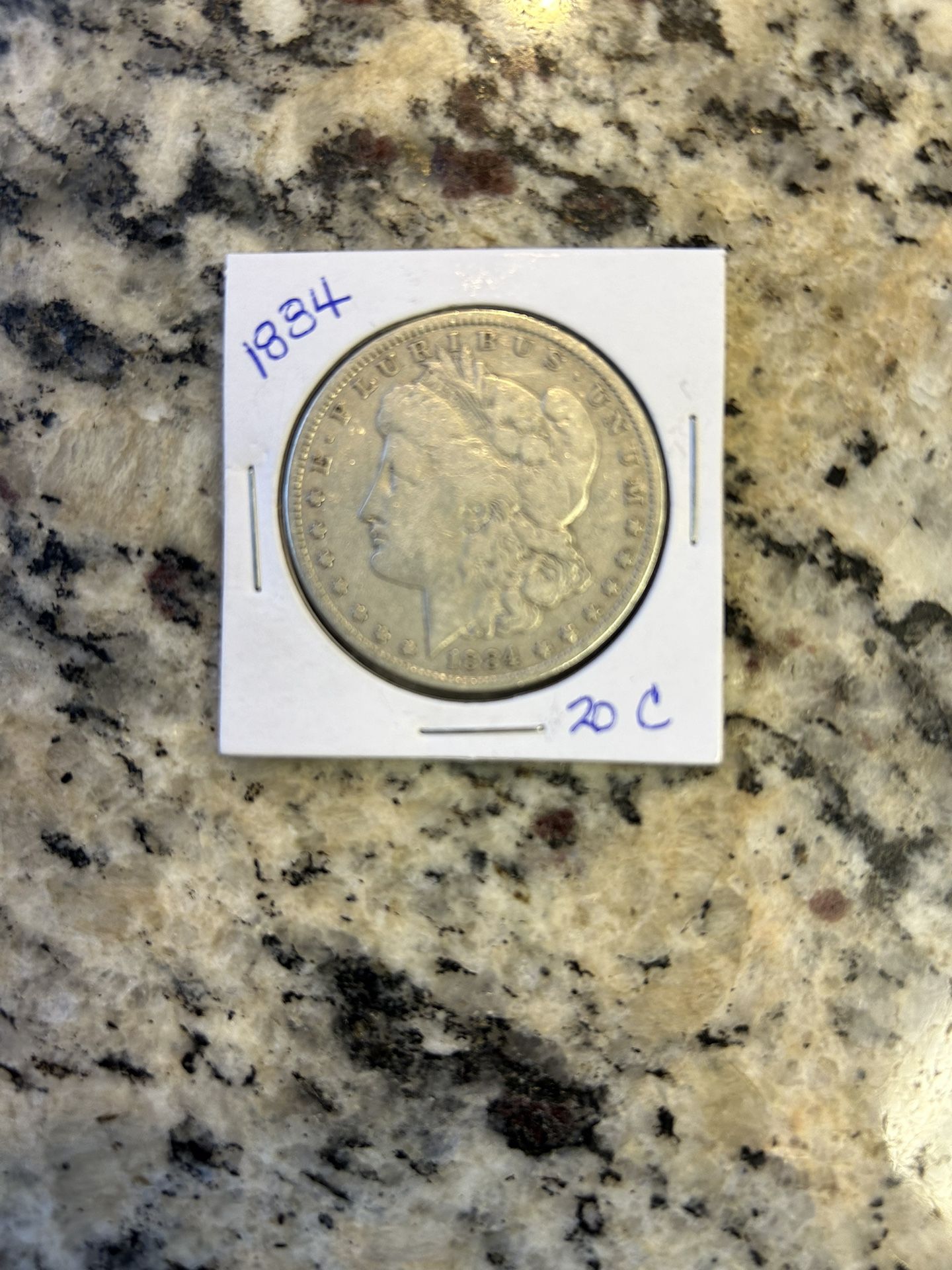 1884 MORGAN SILVER DOLLAR. (20c)