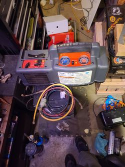 Refrigerent Reovery Machine (ROBINAIR  MODEL 25200A)