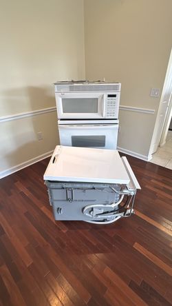 Fully working set of appliances: dishwasher 2024, stove and microwave older yet fully operational