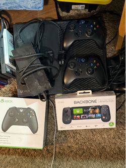 Xbox one with remotes new and new backbone controler