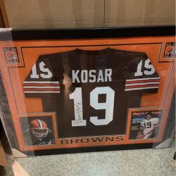 Framed Autographed Bernie Kosar Jersey  (JSA). Magic Johnson and Leroy Kelly .
