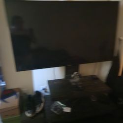 Samsung 55 Inch Flat Screen TV And TV Stand.