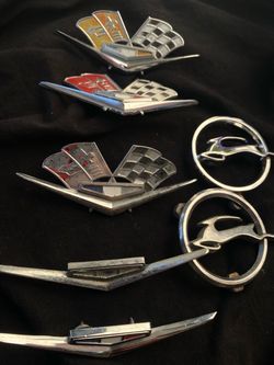 62,63,64 IMPALA ORIGINAL EMBLEMS AND CHROME BEZELS