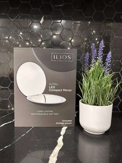 LED compact mirror with extra storage pouch