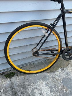 Black Fixie Bike with Yellow and Red Rims