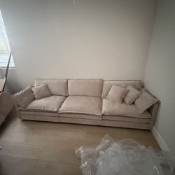 Couch - brand new with ottoman