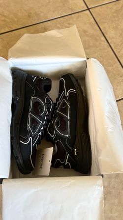 black designer sneakers with box and dust bag