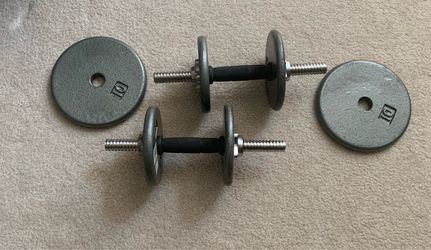 Adjustable dumbbell set with extra plates of 40 pounds