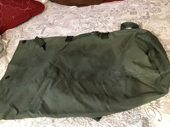 Large green canvas duffel bag, pre-owned