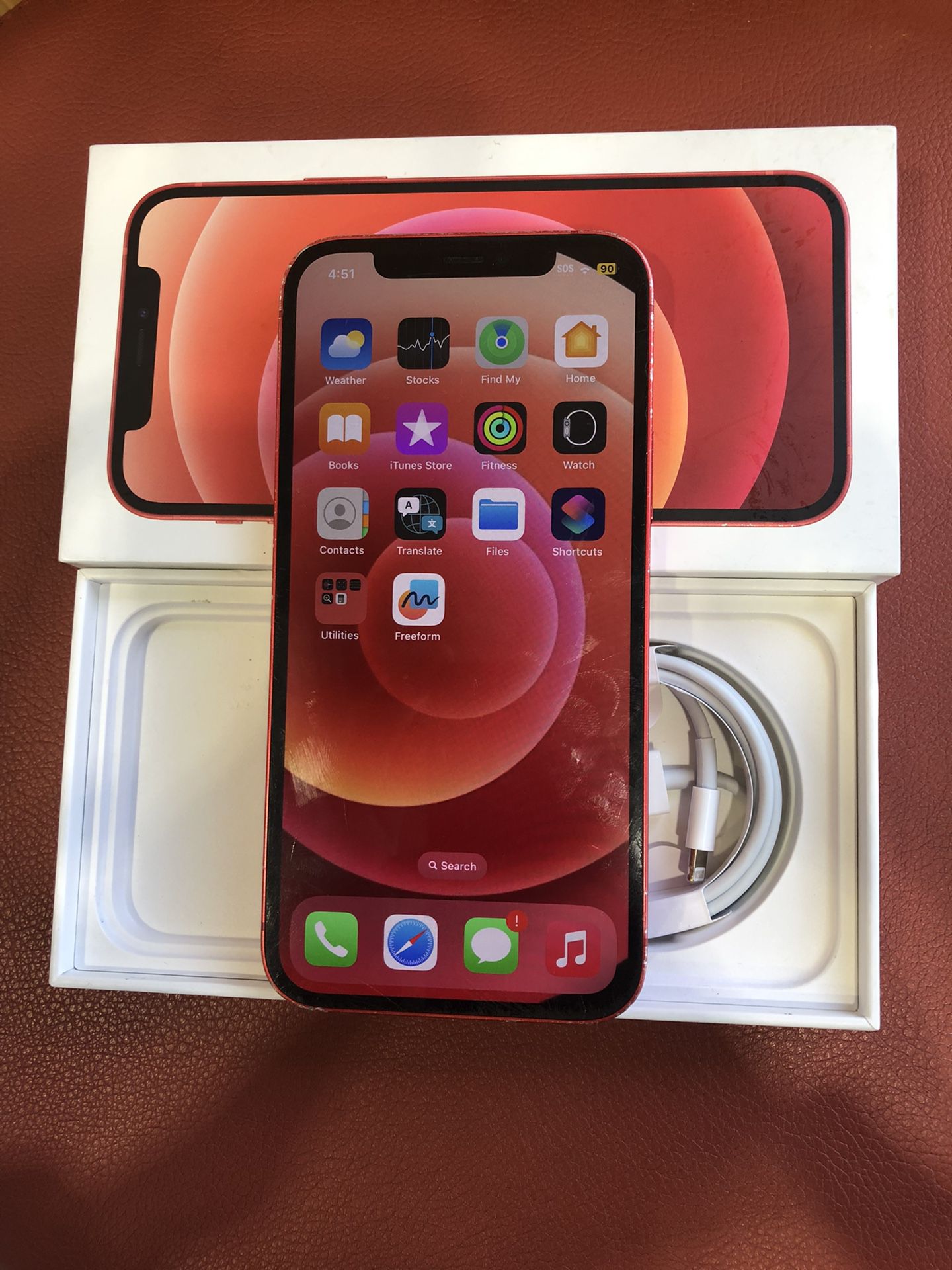 Unlocked iPhone 12 64 GB- Product Red for Sale in Marysville, WA