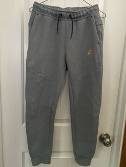 Boys Nike Tech large sweats.
