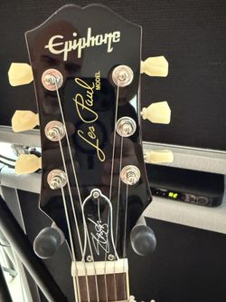 Epiphone electric guitar and Marshall Amp